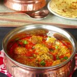 Potato in curd gravy
